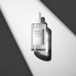 آمپول روشن‌کننده و ضد لک اسکین 1004 مدل Tone Brightening حجم 30 میلی